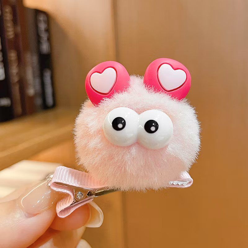 Jepit rambut boneka pom-pom