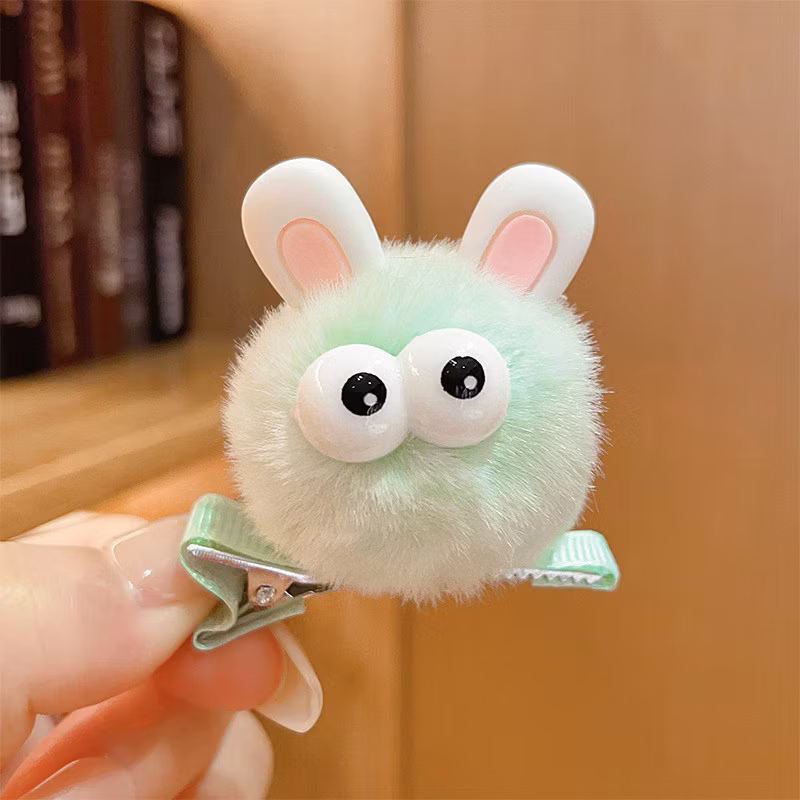 Jepit rambut boneka pom-pom